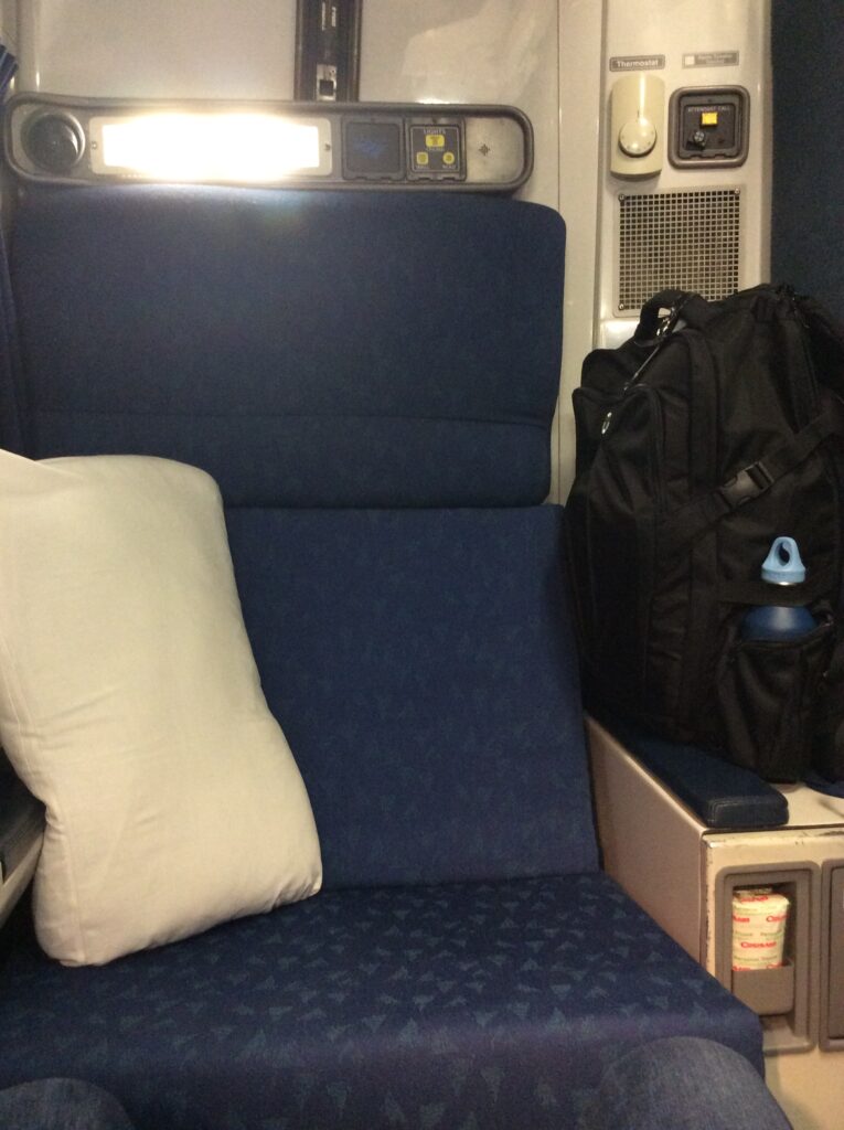 My luggage stored in a Viewliner roomette, there is also a space above the door to put extra baggage. 