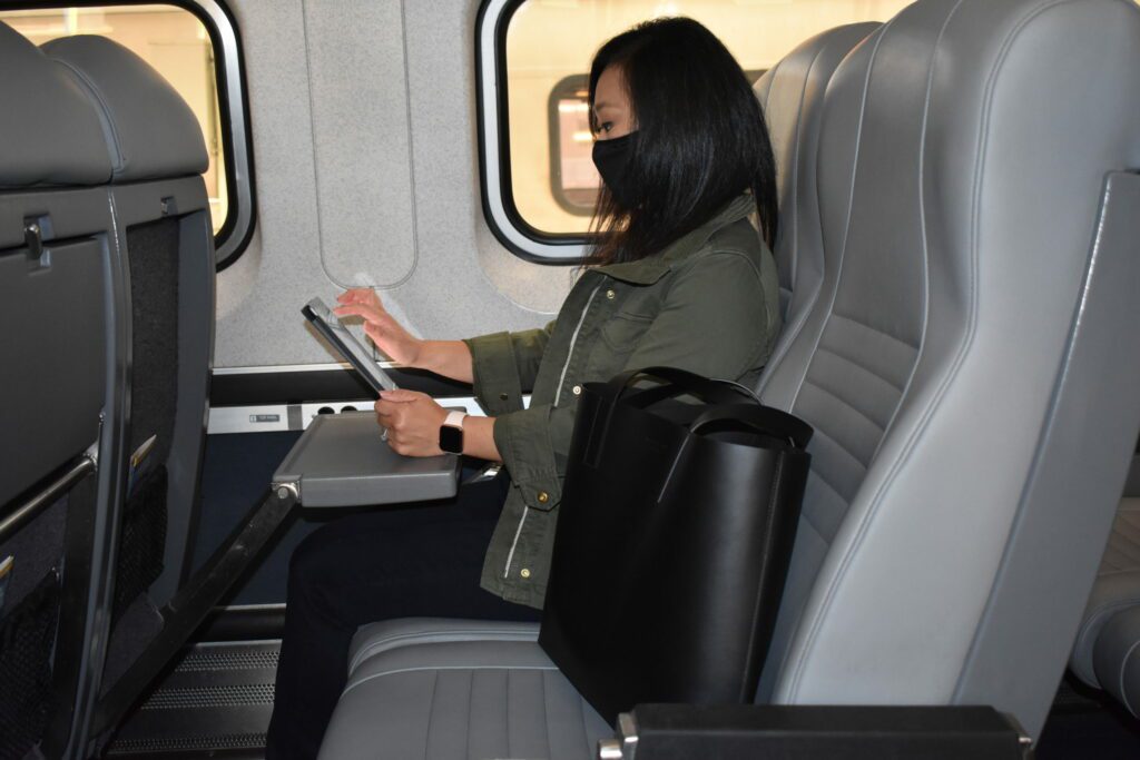 Amtrak passenger on a tablet 