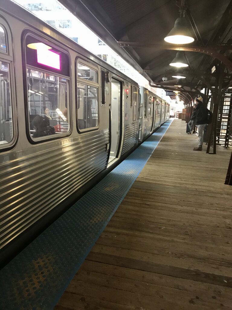 Chicago's CTA Orange line pulling into the Quincy Station