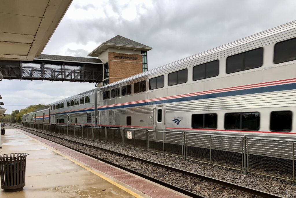 People Boarding An Amtrak Train, The Empire Builder Stopped at the Sturtevant Depot. 