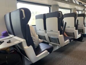 Rows of Amtrak Venture car seats 